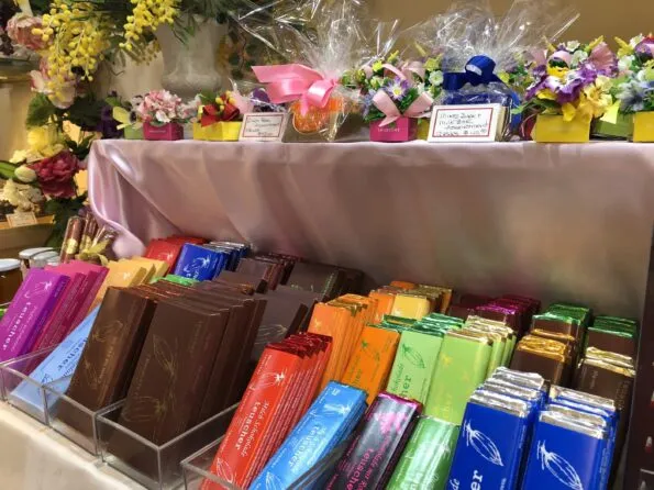 Teuscher bars of chocolate and wrapped gifts to easily take away.