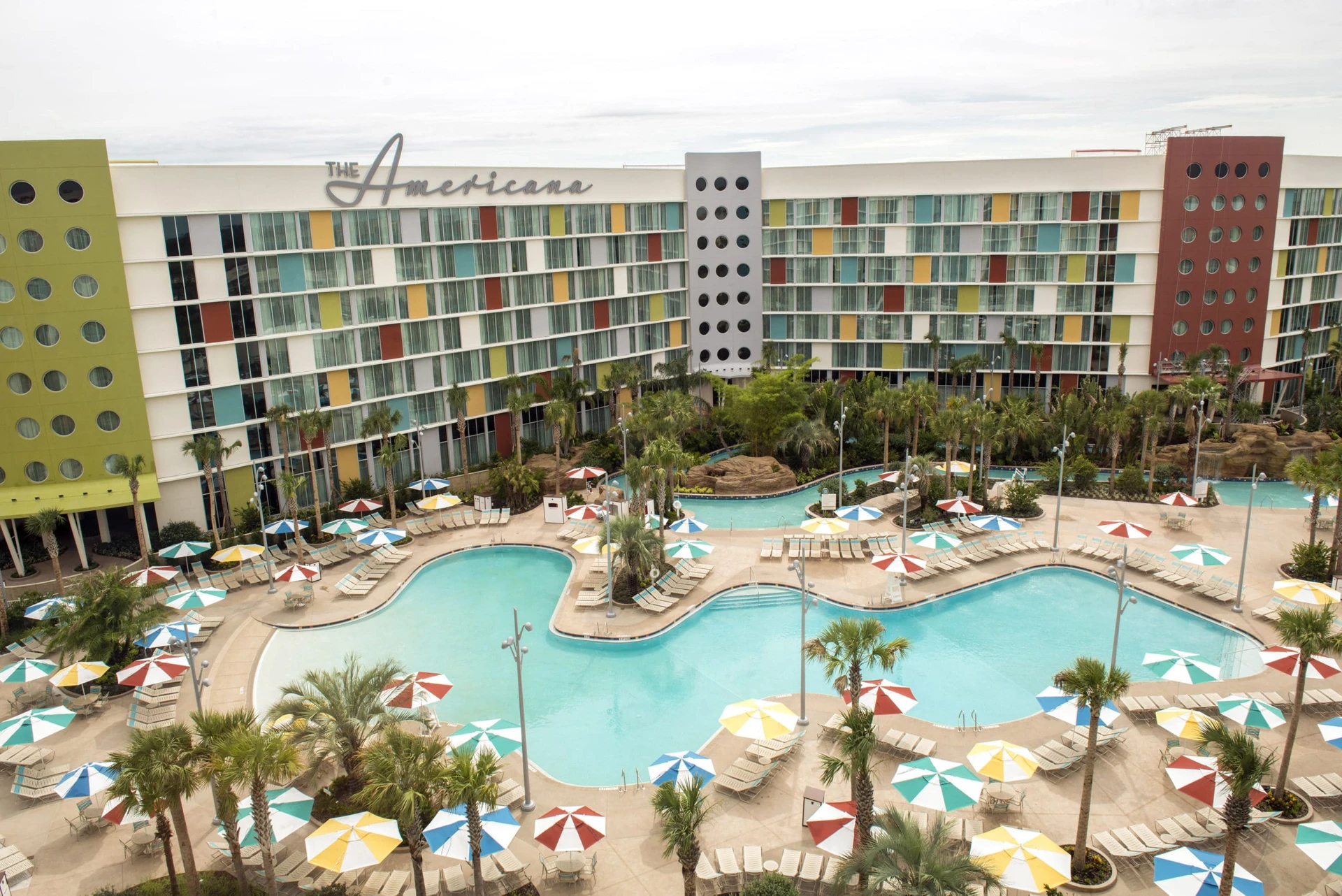 One of the swimming pools and the lazy river at Cabana Bay Beach Resort, an Orlando family hotel.