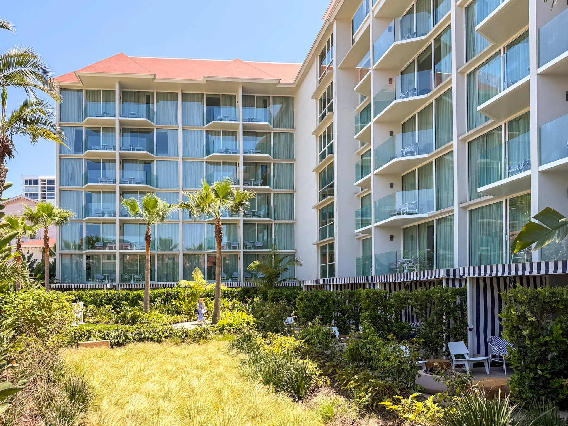 The Views Resort View Terrace with Fire Pit rooms at the back of the building.
