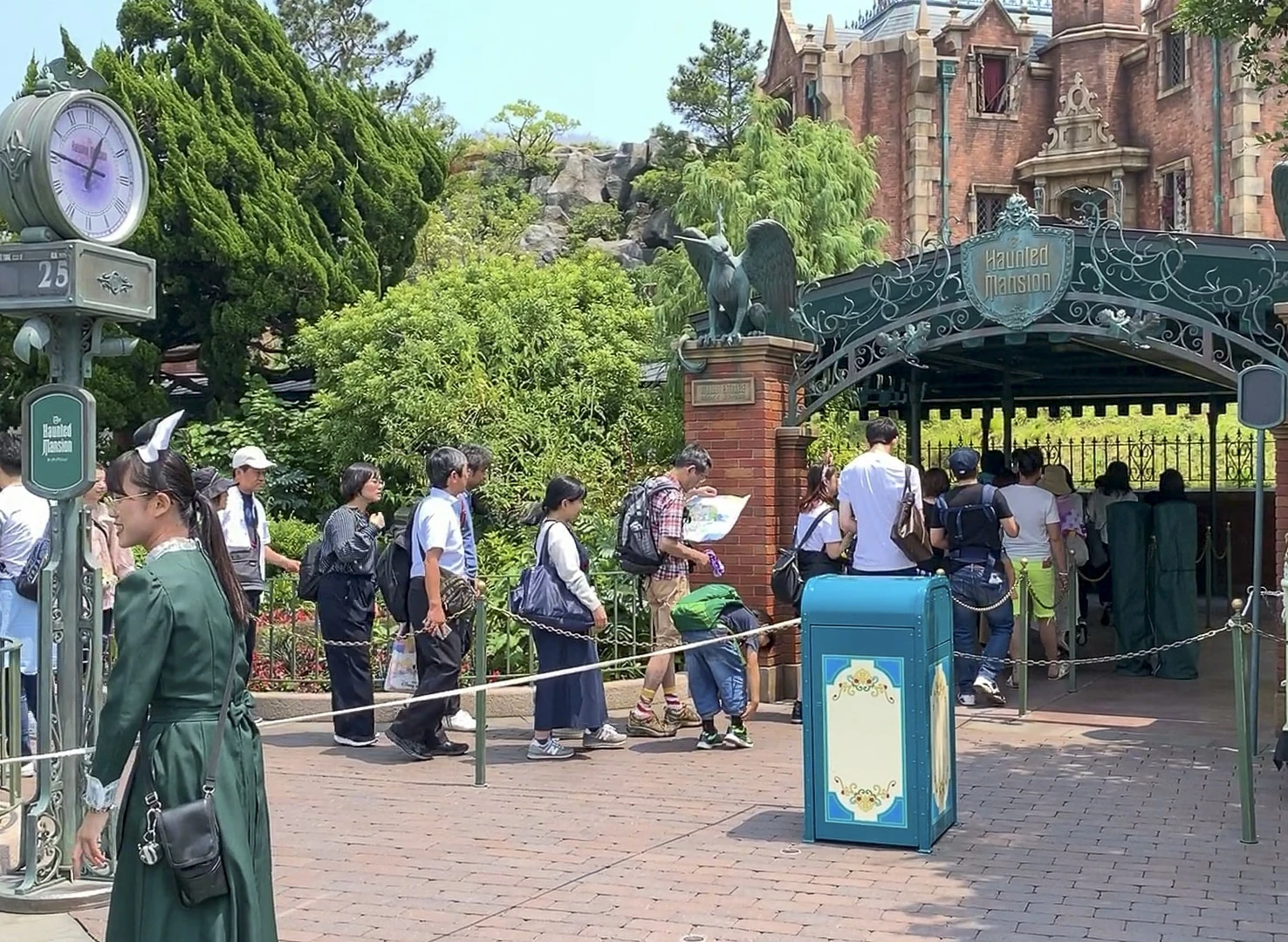 People line up for Haunted Manson at Tokyo Disneyland.