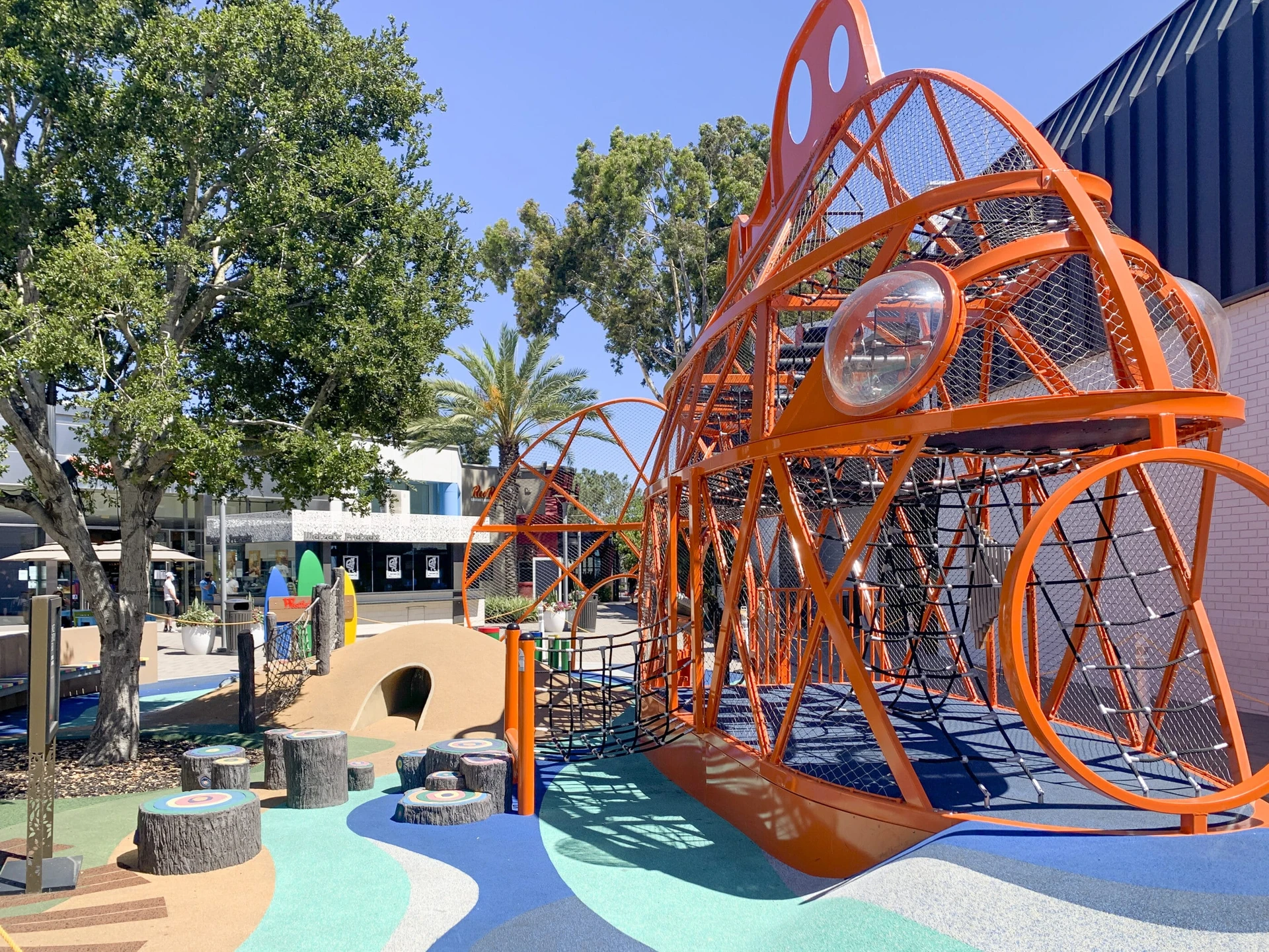 Playground climbing structure near Macy's.
