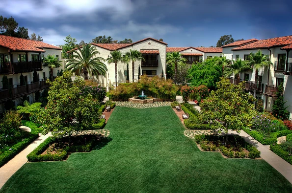 The pretty grassy area where weddings are held at Estancia La Jolla.
