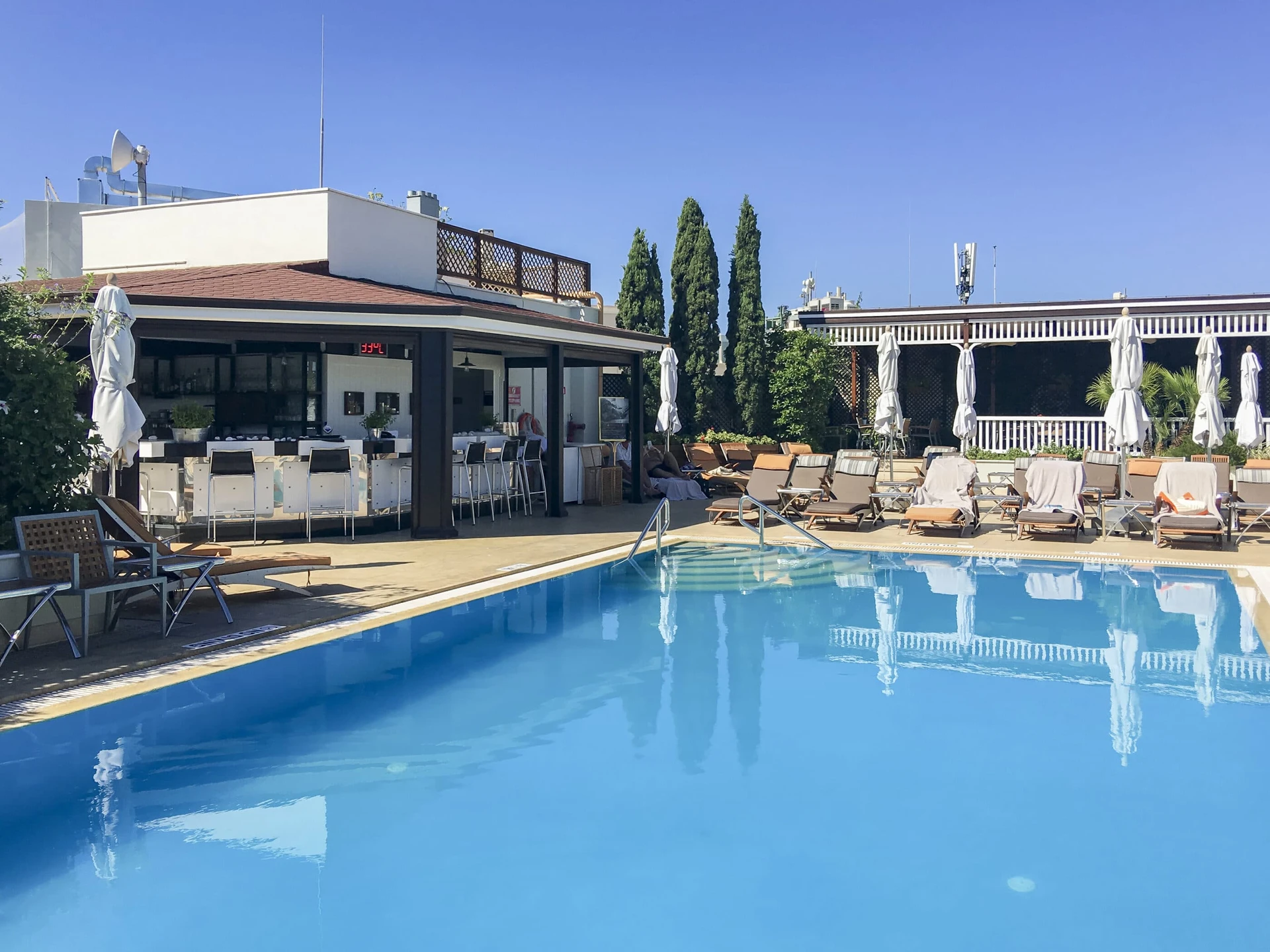 The outdoor swimming pool with GB Grill in the background.