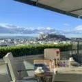View of the Acropolis and Parthenon from the rooftop restaurant at Hotel Grande Bretagne in Athens, Greece.