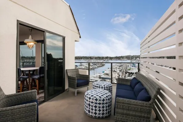 The furnished outdoor veranda overlooking the bay in the Veranda Suite.