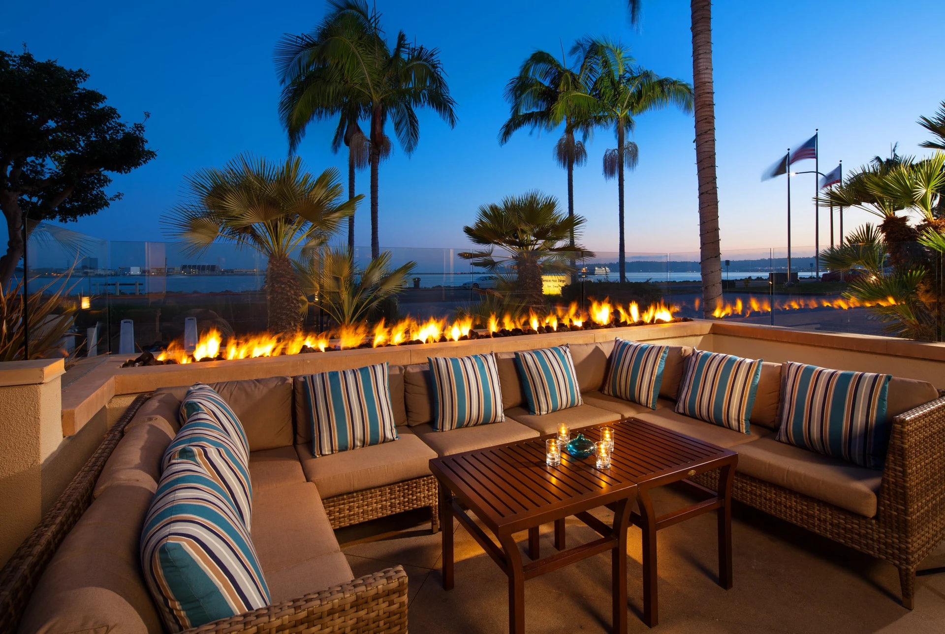 A lounge area on the BTL patio after sunset at Sheraton San Diego Hotel and Marina.