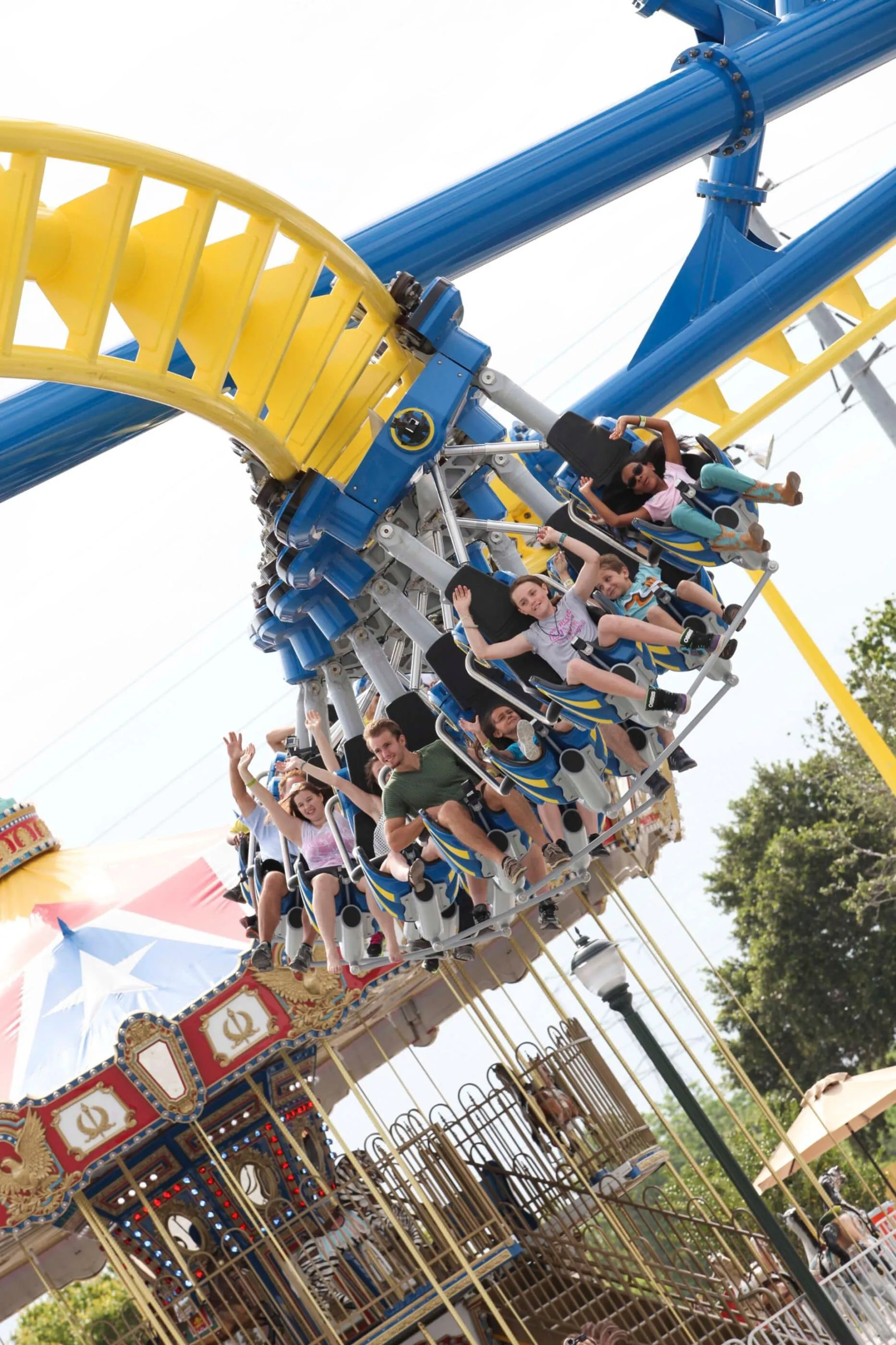 Riders take a spin on one of Fun Spot America's roller coasters.