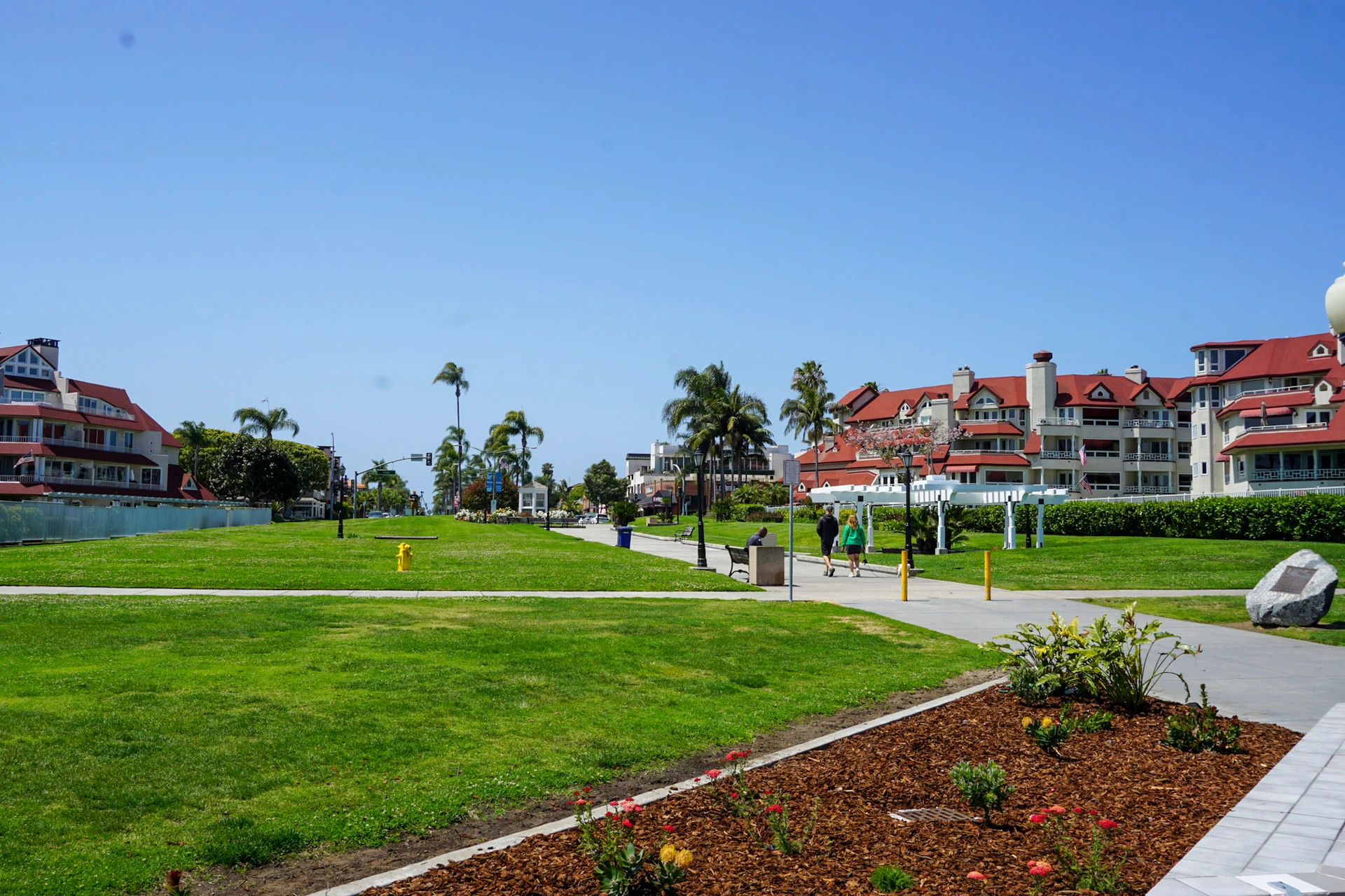 Centennial Park grassy area facing Orange Avenue.