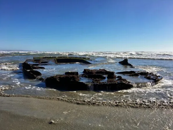 SS Monte Carlo Coronado shipwreck revealed on the beach during low tides.