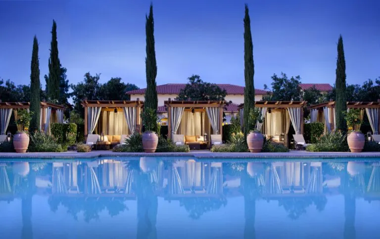 The spa pool and cabanas with evening light