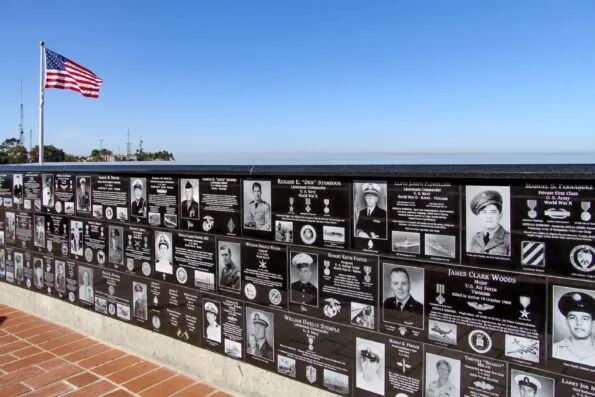 One of the black marble plaque walls honoring veterans.