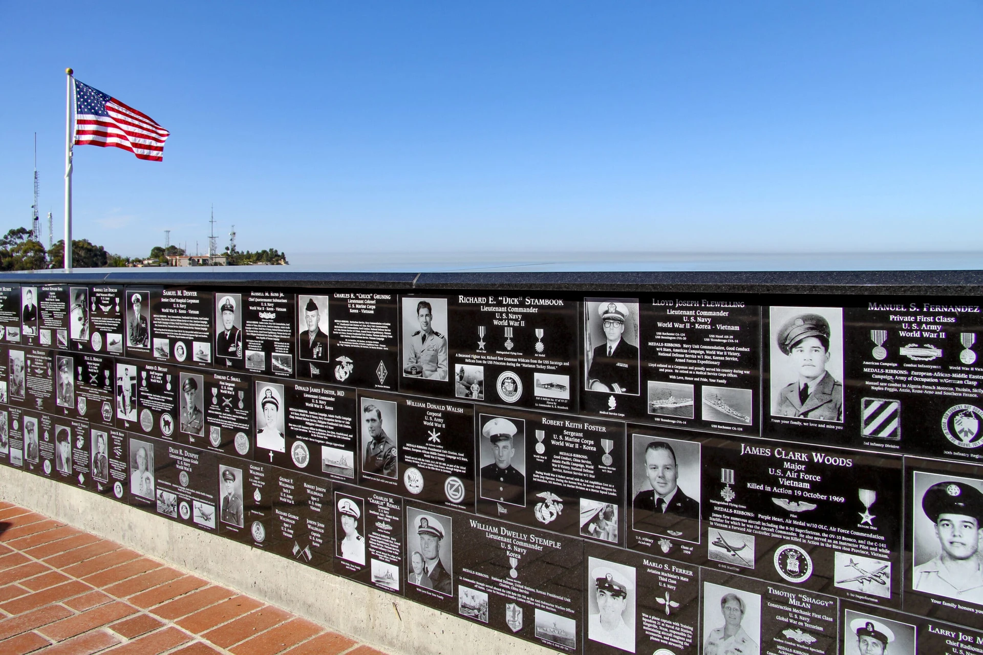 One of the black marble plaque walls honoring veterans.