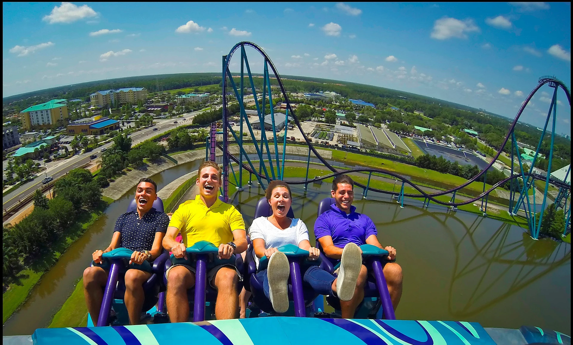 Guests ride backwards down a drop on the Mako roller coaster.