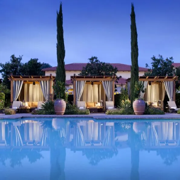 The spa pool and cabanas with evening light