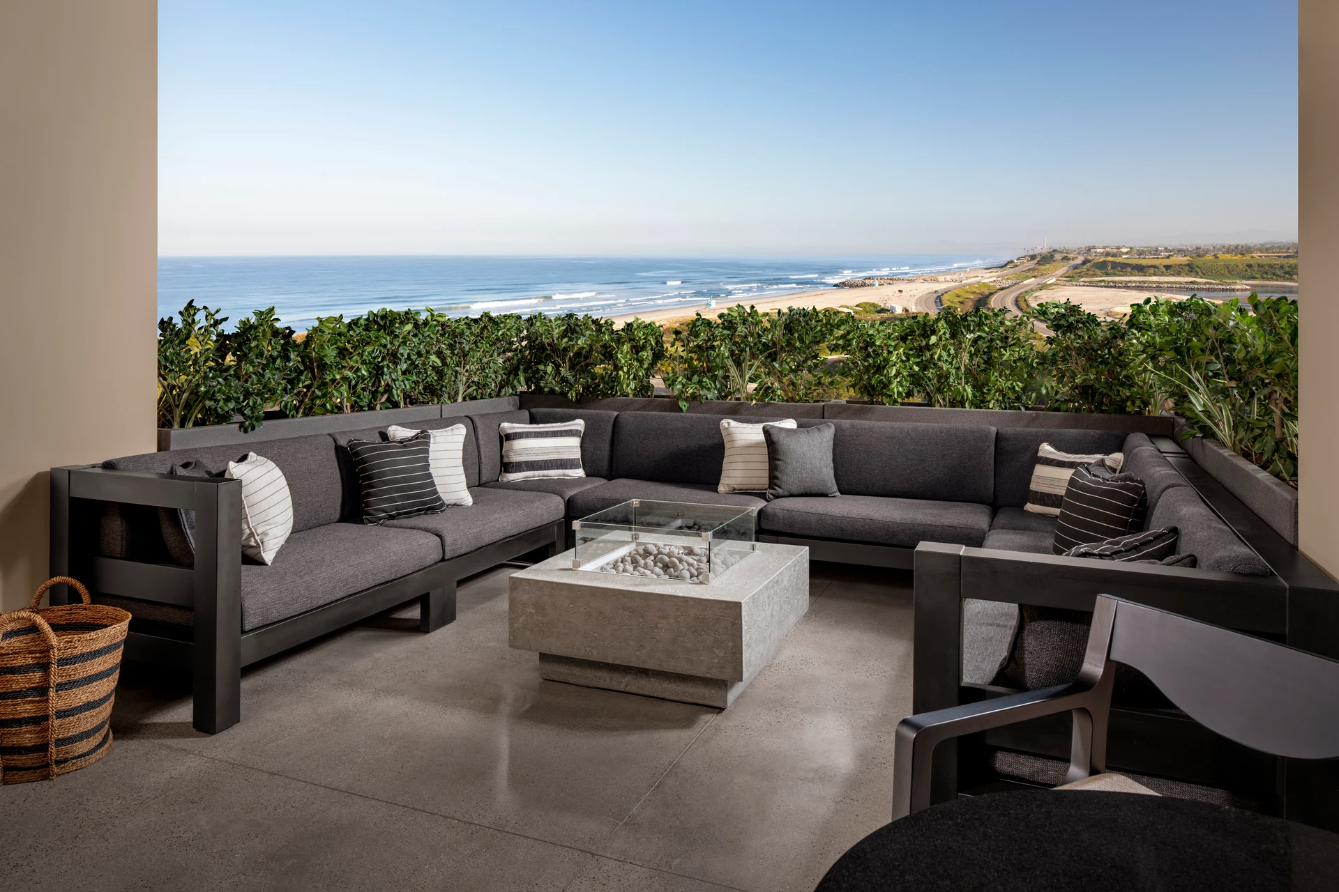 Outdoor couches and fire pits with ocean views at Alila Marea Resort Encinitas
