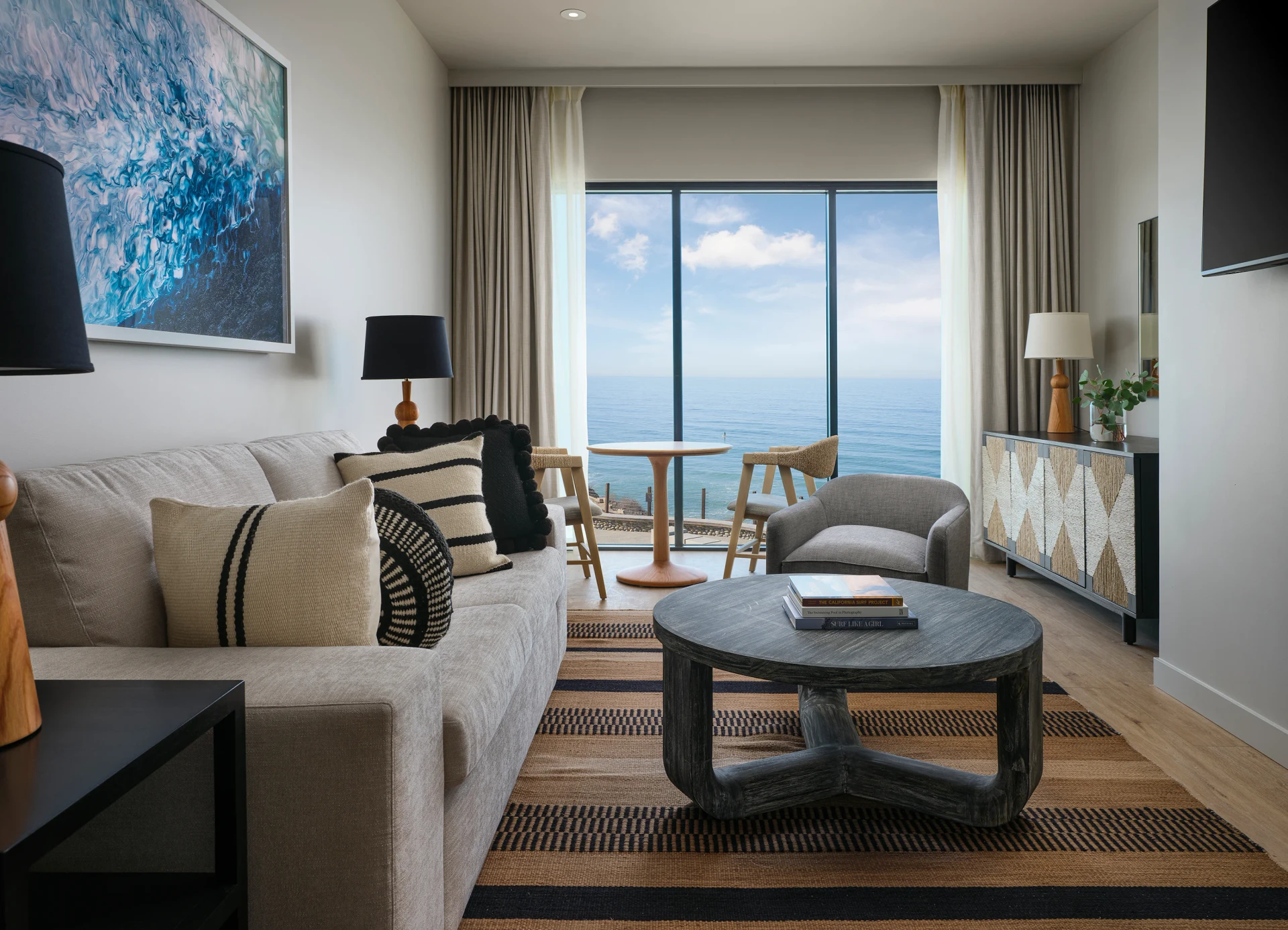The living room with ocean view of a one bedroom suite.