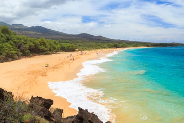 Clear water and sandy beach at Makena State Beach.