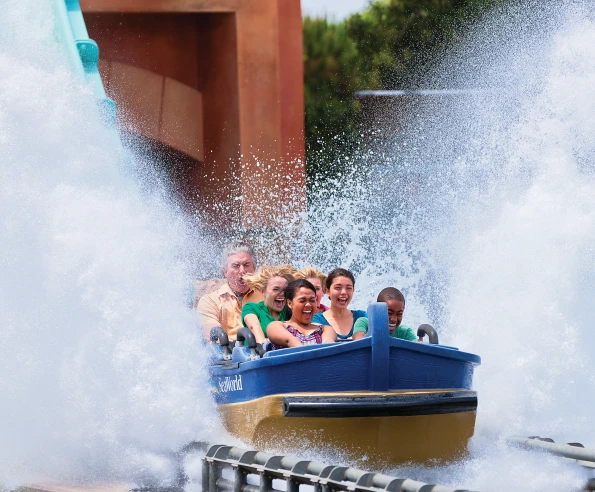 Riders get soaked by water on Journey to Atlantis.