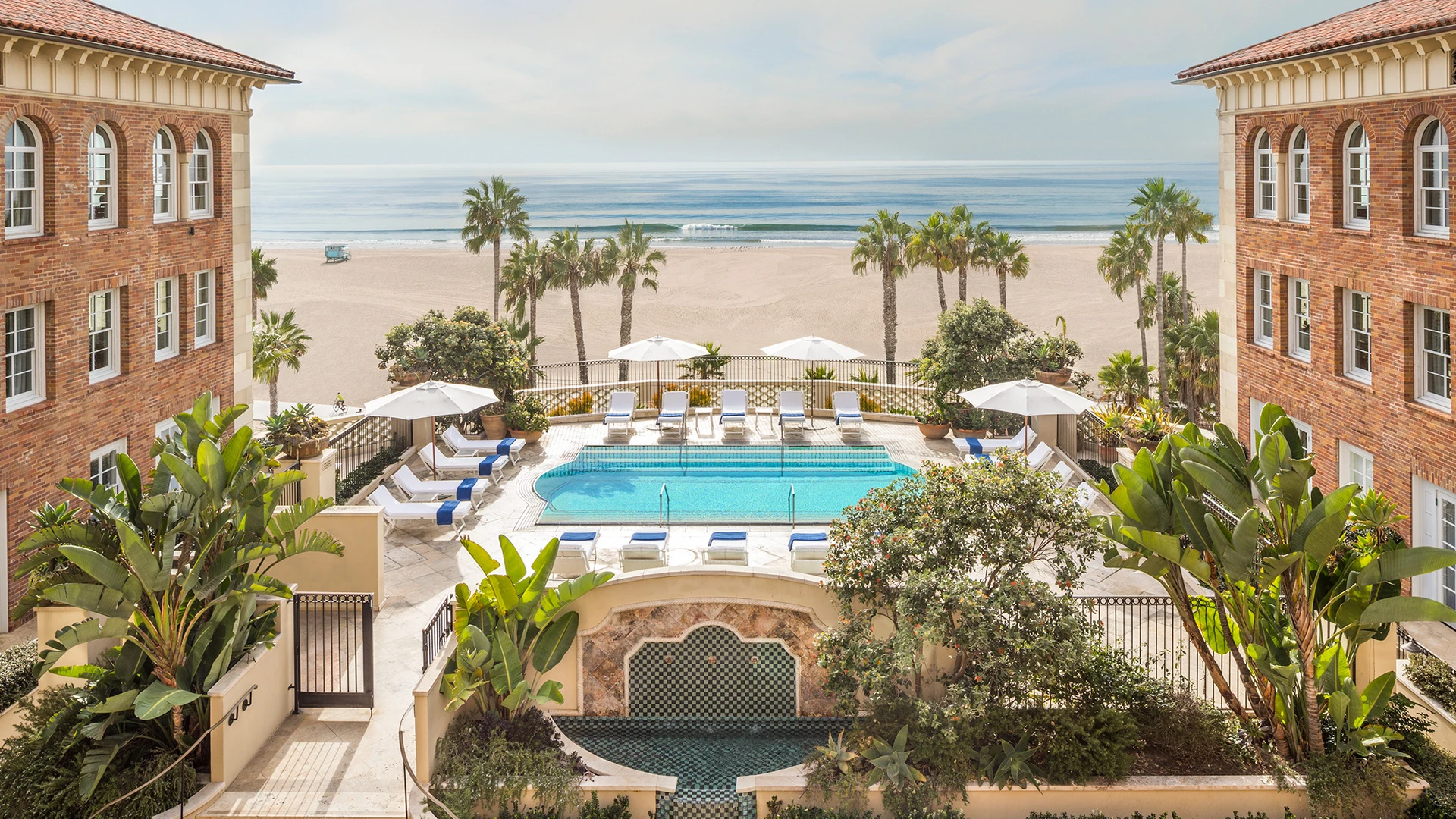 View over the pool to the beach at Hotel Casa Del Mar in Santa Monica.