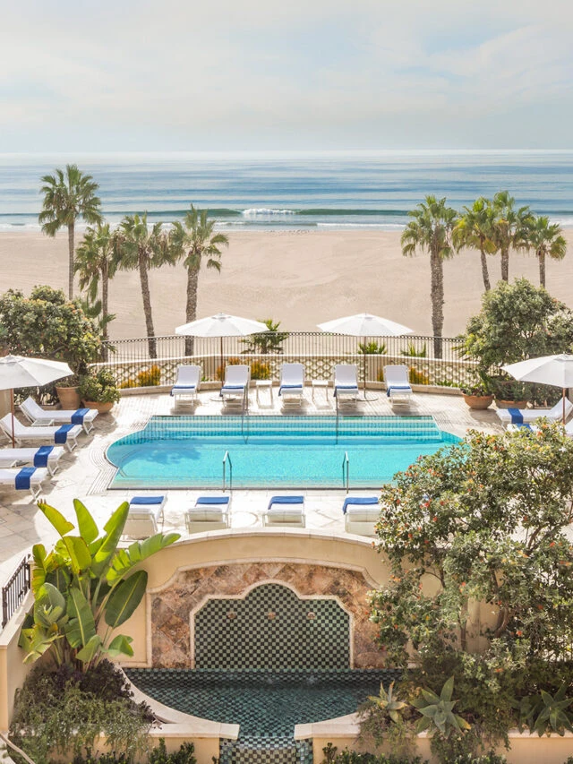 View over the pool to the beach at Hotel Casa Del Mar in Santa Monica.