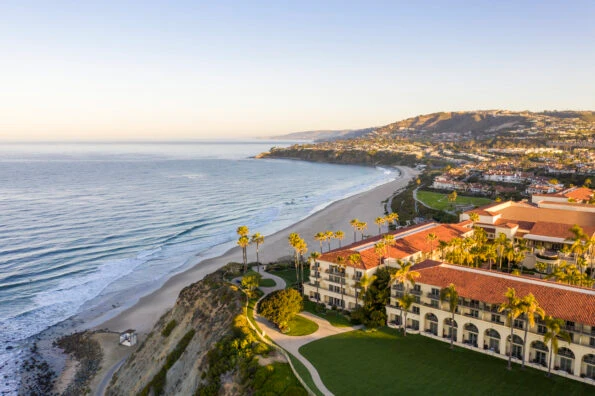 Aerial view of The Ritz-Carlton Laguna Niguel down to the beach.