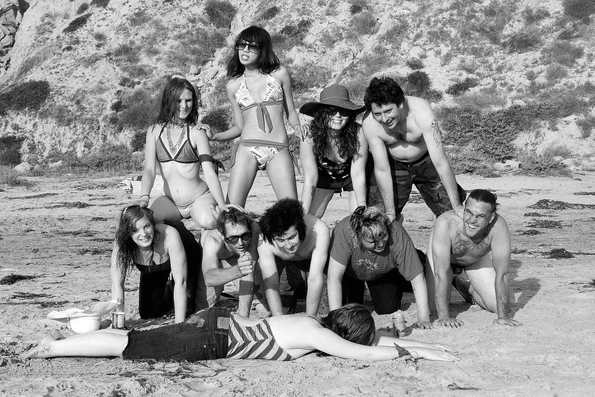 People in a pyramid on Black's Beach La Jolla.