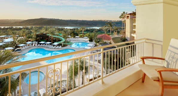 Pool View room balcony overlooking the swimming pool area.