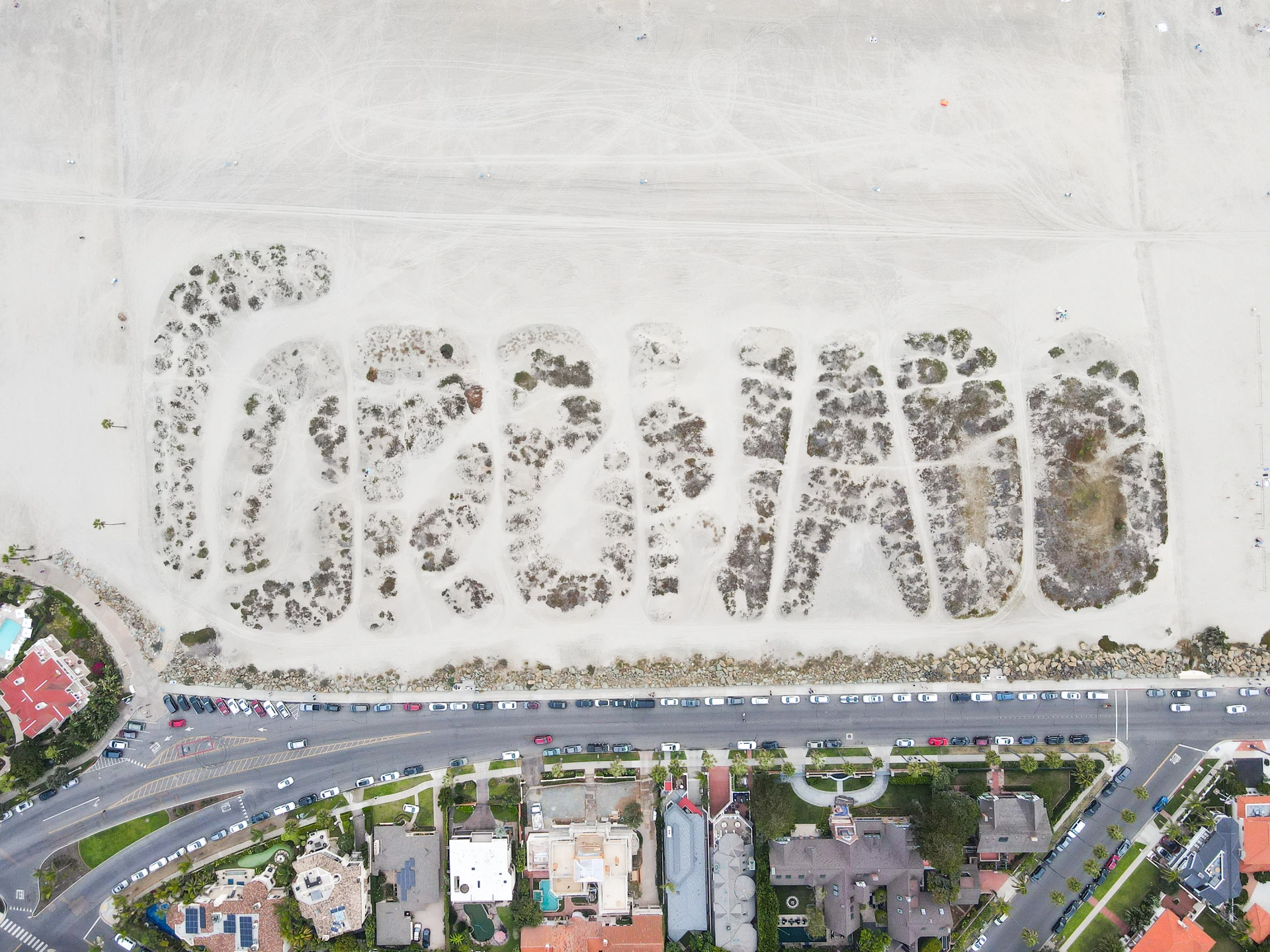 Aerial view of Coronado sand dunes secret message in San Diego, California.