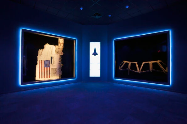 Fuselage from Challenger and window frames from Columbia in glass displays in the Forever Remembered exhibit.