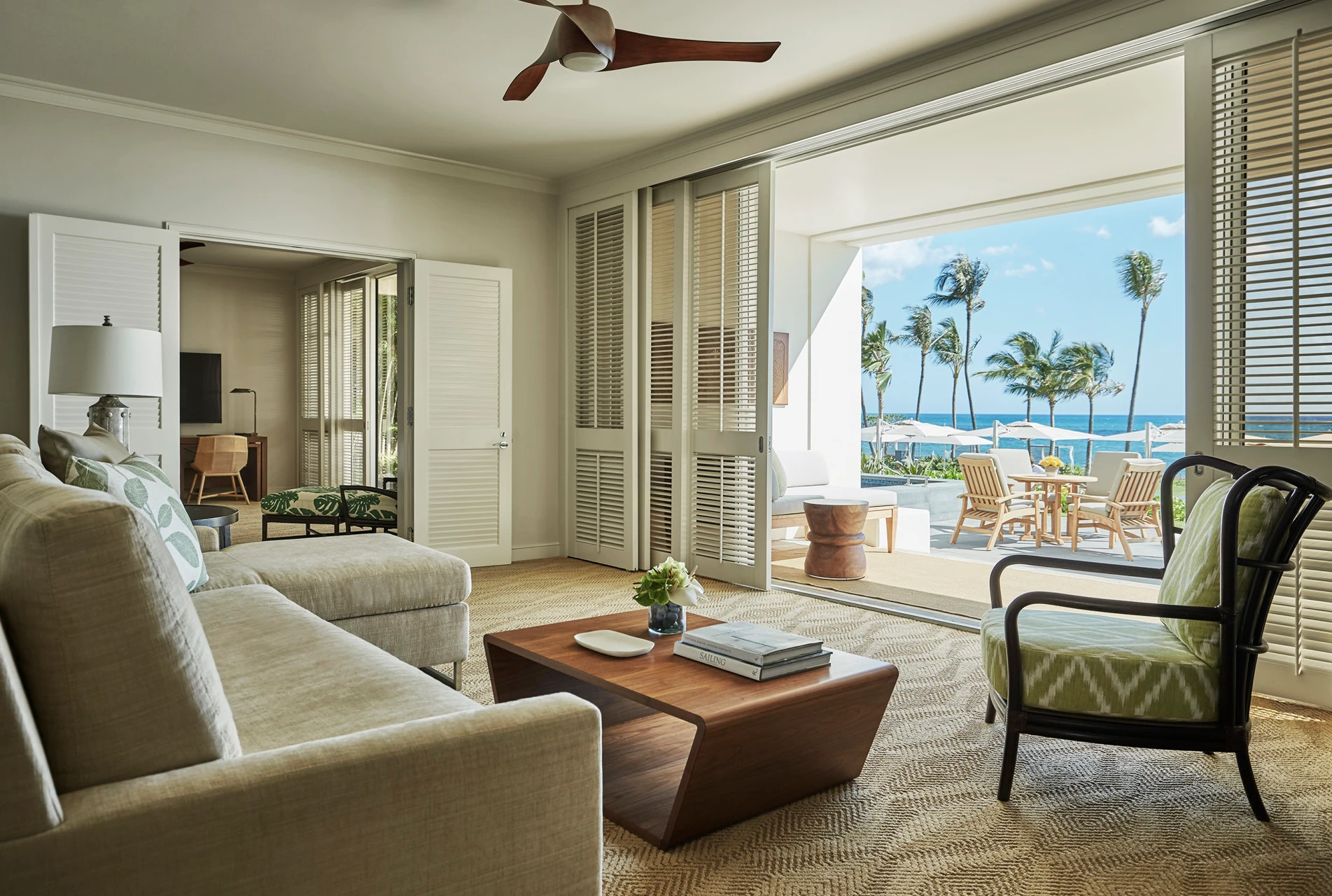 The Pacific Suite living room looks out on to the ocean.