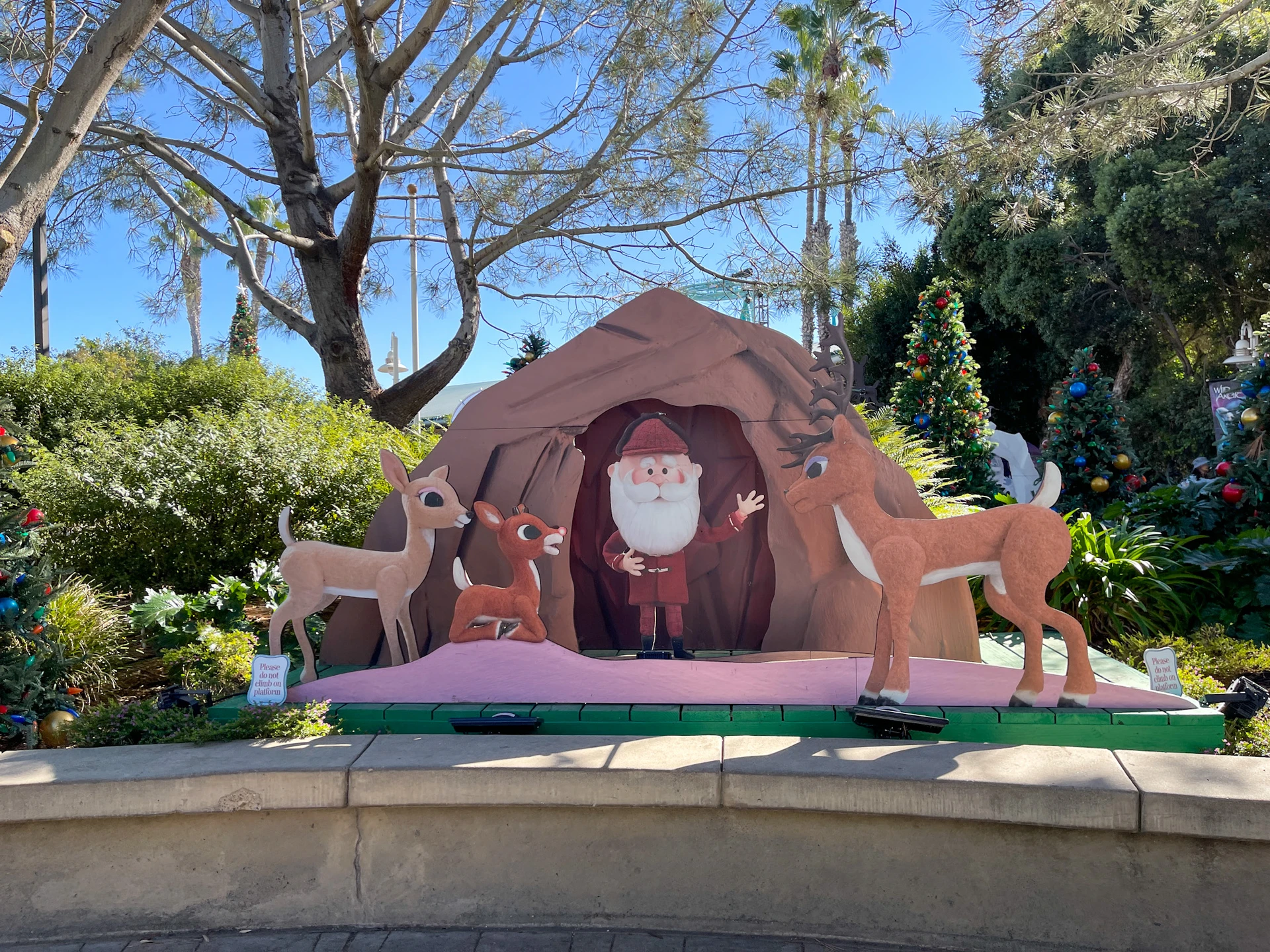 A Santa and reindeer backdrop at SeaWorld San Diego Christmas Celebration.
