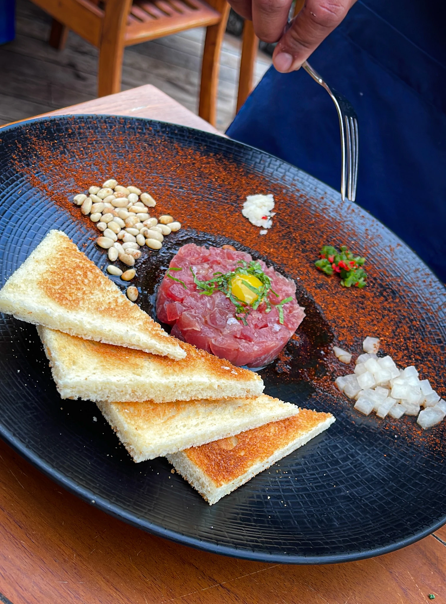Tableside Michael&rsquo;s tuna tartare at Mina&rsquo;s Fish House.
