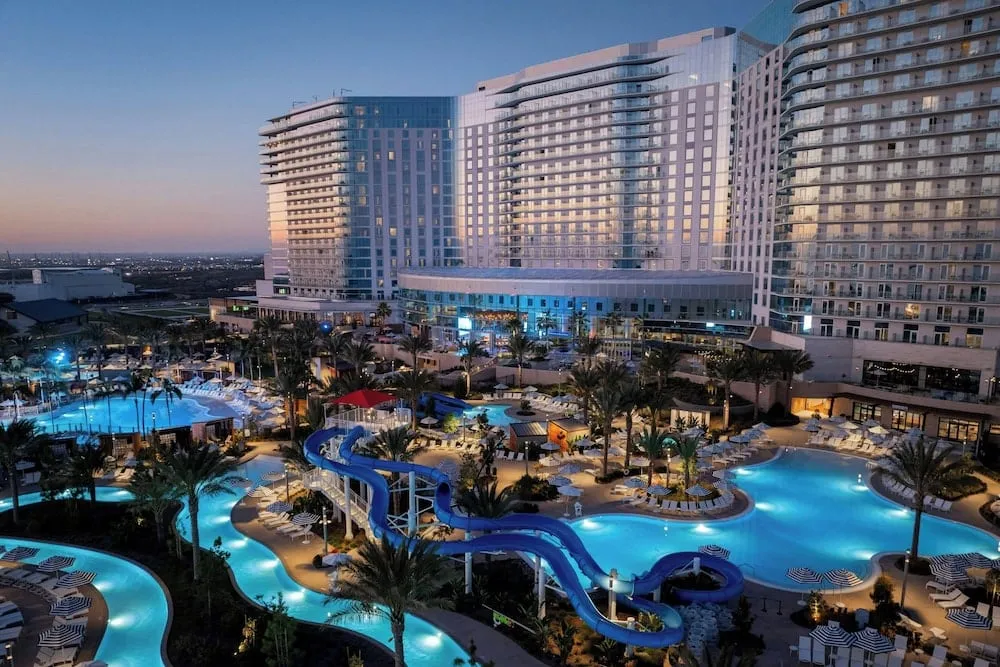 The water park pool area of Gaylord Pacific at dusk.