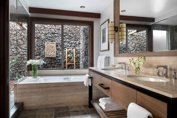 A guest room bathroom at Four Seasons Hualalai in Hawaii