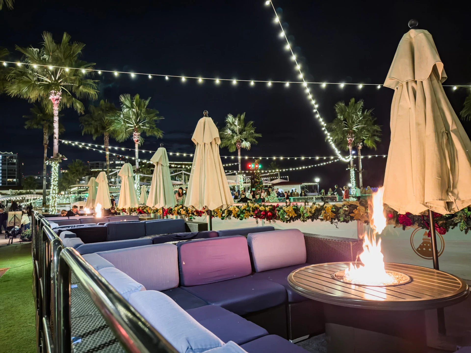 A fire burns in a table at a fireside lounge table at Hotel del Coronado Christmas.