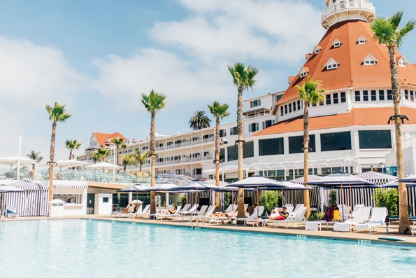 Main pool at Hotel del Coronado with Victorian building in the background.