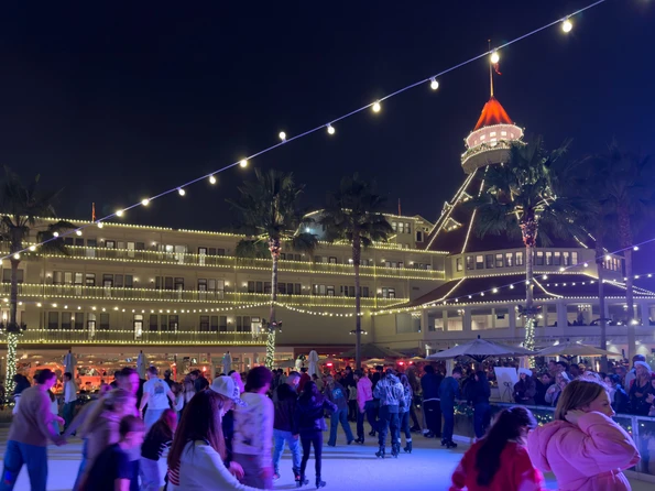 Crowds ice skate and enjoy Hotel del Coronado Christmas.
