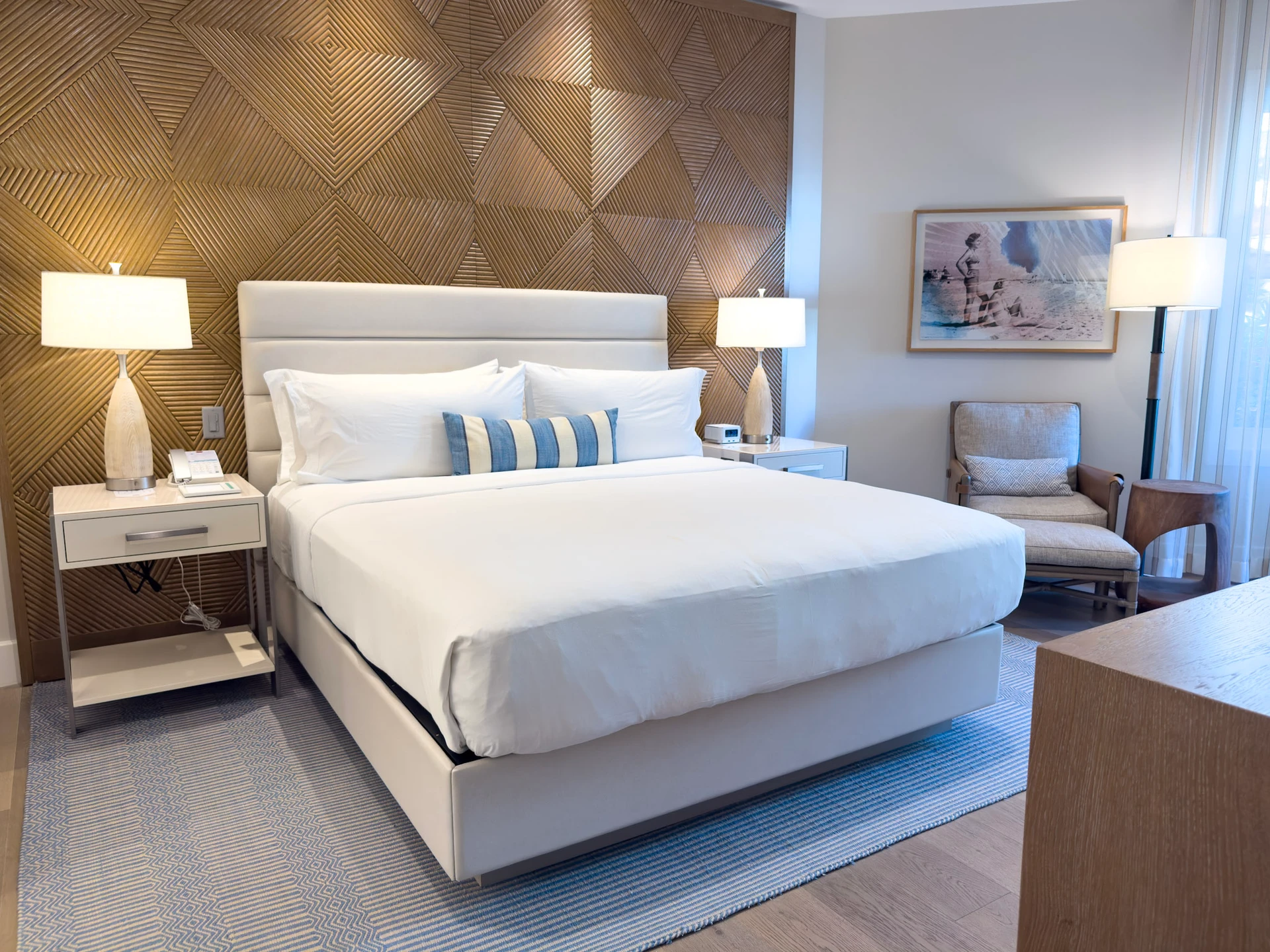 A villa bedroom with king bed at Shore House at The Del.