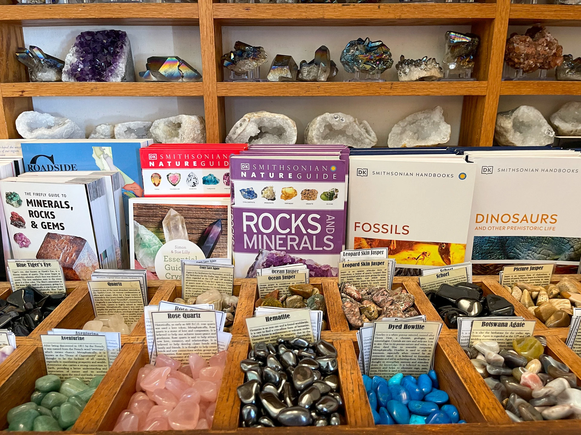 Loose rocks and gems on display inside Miner's Gems and Minerals.