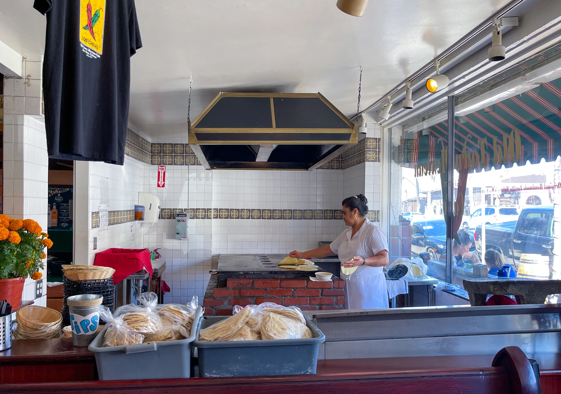 A tortilla lady makes tortillas at Old Town Mexican Cafe.