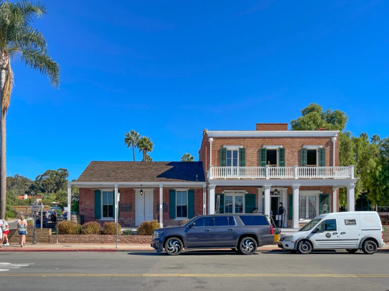Exterior view of the Whaley House Museum in San Diego on a sunny day.