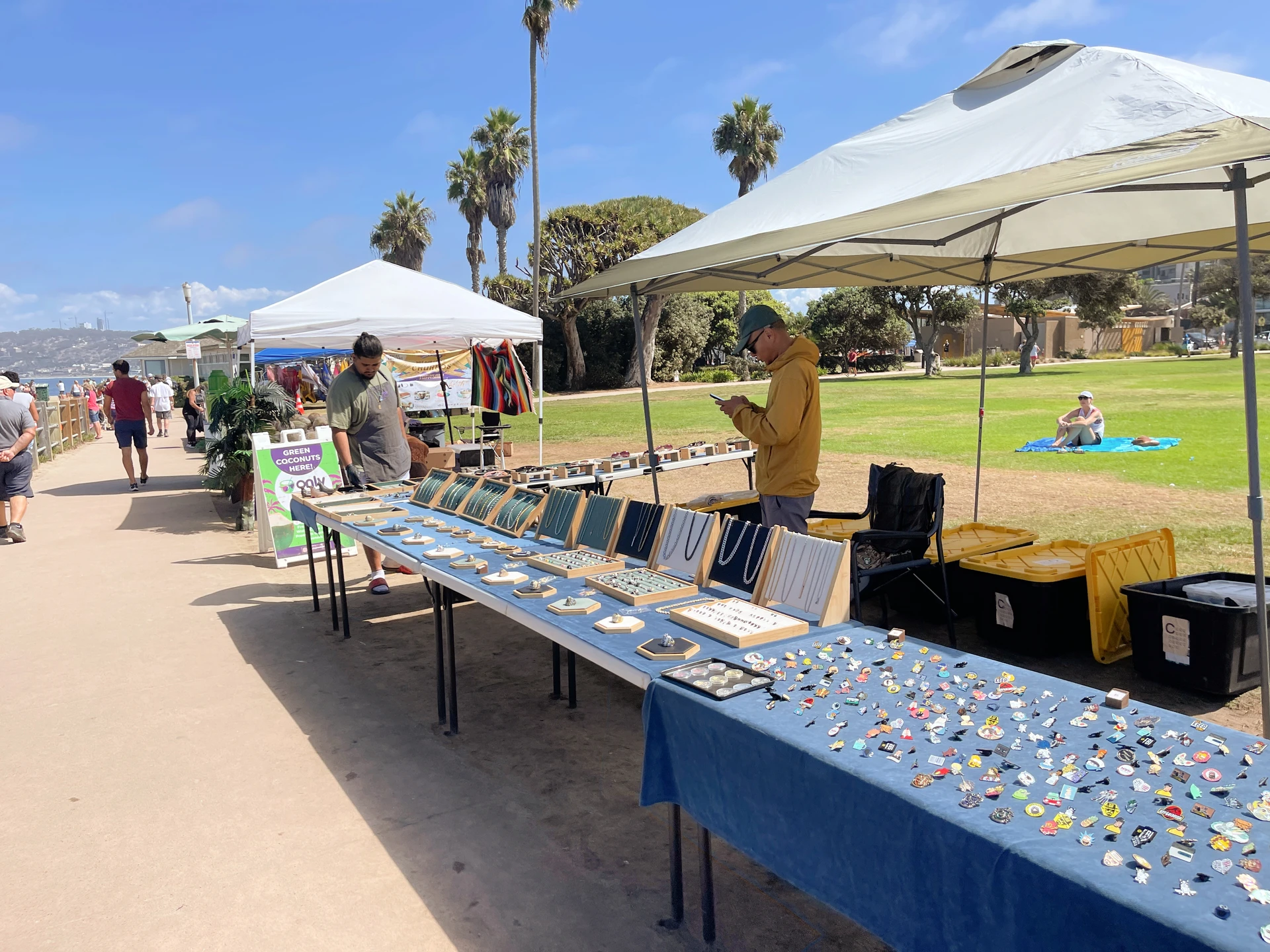 Vendors sell items at La Jolla Cove.