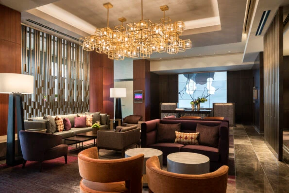 Lobby seating and front desk at Four Seasons Hotel Silicon Valley at East Palo Alto