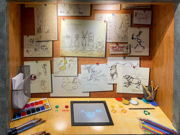 Cartoon sketches hanging on the wall in the Animation Academy.