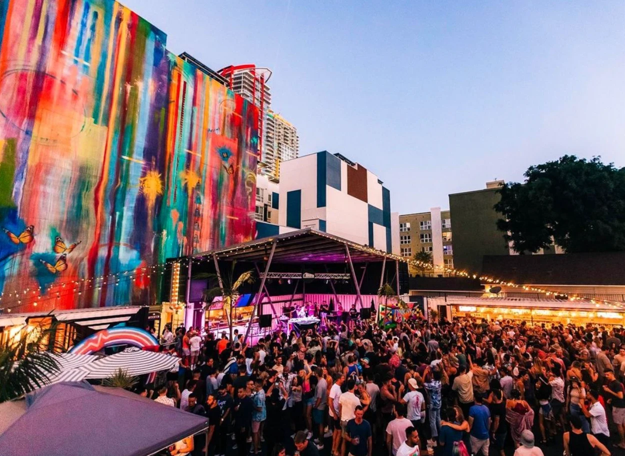 A crowd surrounding a stage at The Quartyard in East Village.