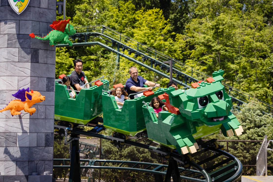 Guests ride the Dragon Coaster for less thanks to discount LEGOLAND New York tickets.