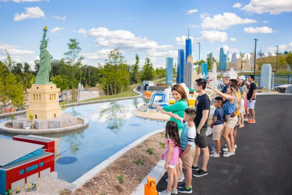 Kids look at Miniland at LEGOLAND New York.