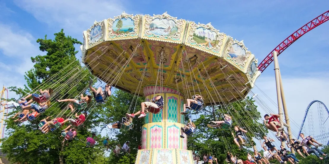 Wave swinger ride spins around.