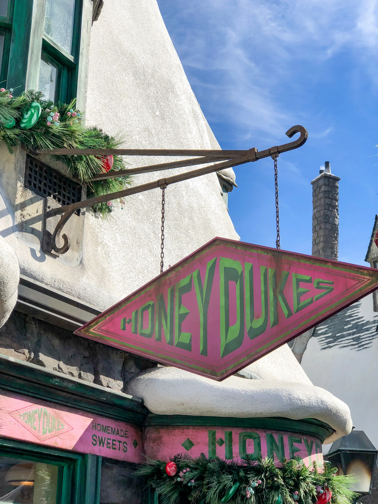 The Honeydukes sign at Universal Studios Hollywood on a sunny day.