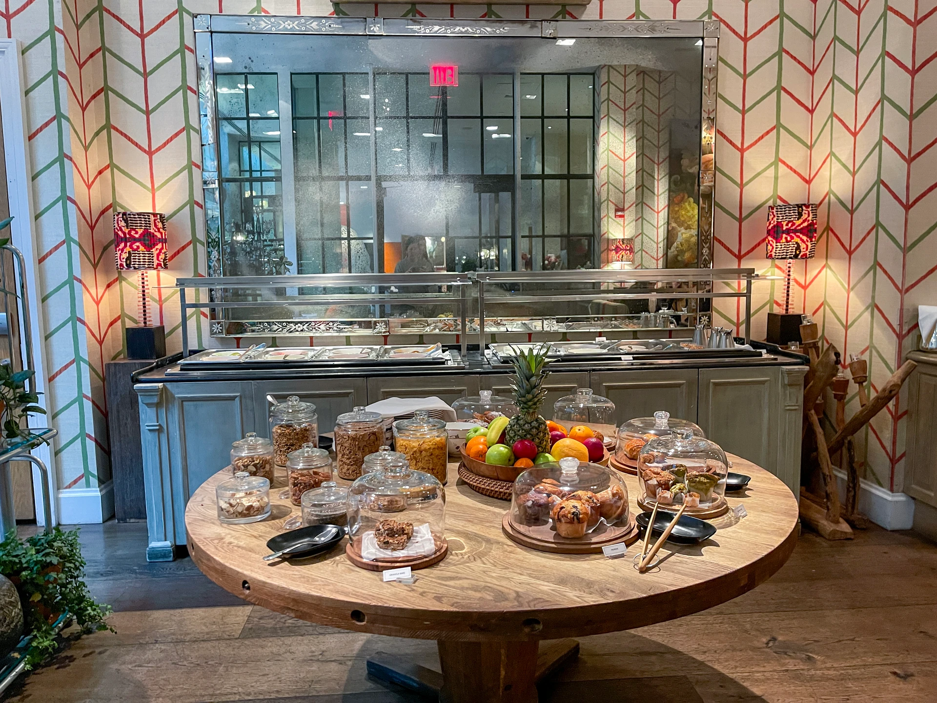 Pastries on a wooden table during the breakfast buffet.